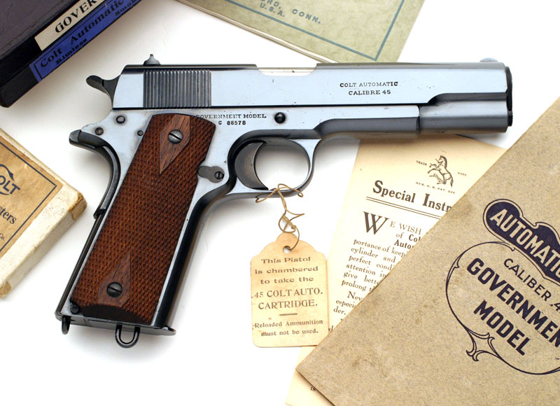 Colt Government Model in original box with accessories.